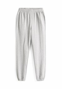 Grijze trainingsbroek met een elastische tailleband, taps toelopende benen en zijzakken. Gemaakt van zachte stof met een gladde textuur en minimale details.