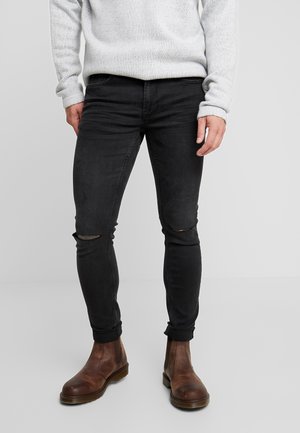Vaqueros pitillo - black denim