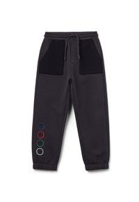 Donkergrijze sweatpants met zwarte zakken, een elastische tailleband en gekleurde cirkels in rood, groen, blauw en wit aan één kant.