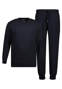 Granatowy zestaw sk�ładający się z bluzy i spodni. Bluza ma białe kropki, ściągacze przy rękawach oraz dekolcie. Spodnie mają elastyczny pas i kieszeń po bokach.