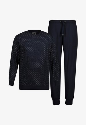 Navy pullover and pants set. Pullover features white polka dots, ribbed cuffs, and neckline. Pants have an elastic waistband and side pocket.