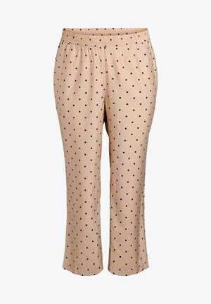 Beżowe spodnie pajamasowe z elastycznym paskiem, z wzorem czarnych kropek. Miękka, lekka tkanina; luźny krój.