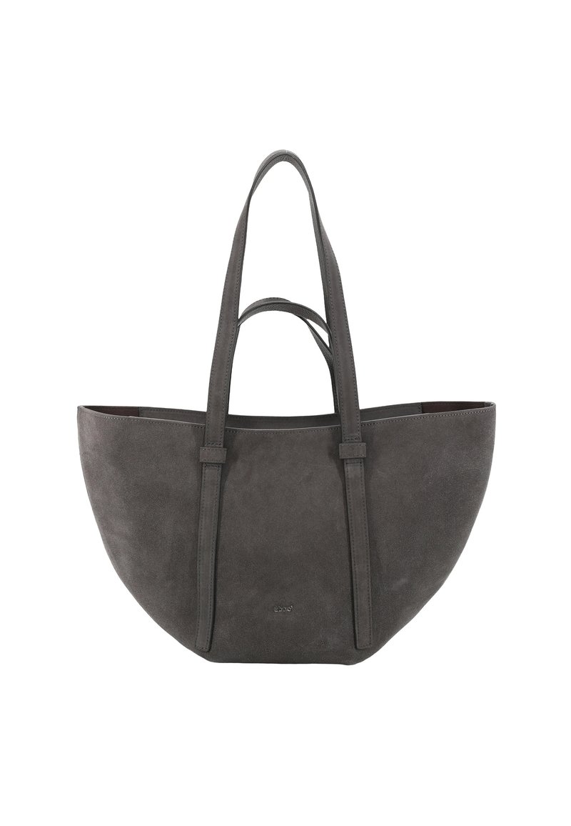 Graue Wildleder-Tote-Tasche mit einer runden Form, ausgestattet mit langen Trägern und minimaler Hardware. Sanfte Textur mit einem subtilen Glanz.