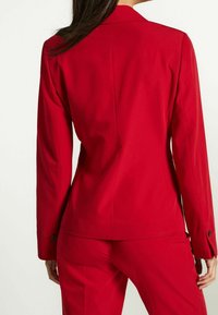 Next Bleiseri - red
