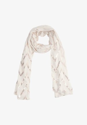 Sciarpa beige chiaro con motivo a zigzag metallizzato color oro rosa, annodata con un giro morbido e le estremità pendenti.