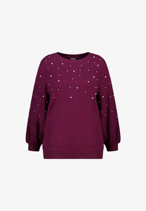 Pruimkleurige langmouwtrui met ronde halslijn, versierd met verspreide kleine parelachtige kraaltjes aan de voorkant en mouwen.