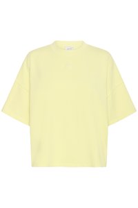 Lysegul kortærmet oversized T-shirt med rund hals og diskret lille logo centreret på brystet.