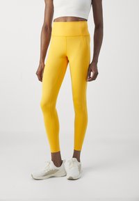 Girlfriend Collective LEGGING LONG - Tajice - golden glow