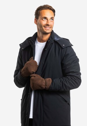 Schwarze isolierte Jacke mit einem Reißverschluss vorne, Druckknöpfen und braunen weichen Fäustlingen. Verfügt über ein gepolstertes Design und einen hohen Kragen für Wärme.