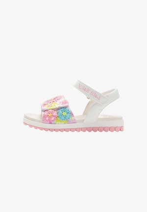 Sandalo bianco per bambini con suola rosa smerlata, cinturini in velcro e decorazioni floreali colorate ricamate sulla fascia anteriore.