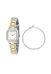 Orologio metallico argento e oro con quadrante bianco quadrato accanto a un bracciale argento caratterizzato da pietre trasparenti rotonde incastonate in una delicata catena.