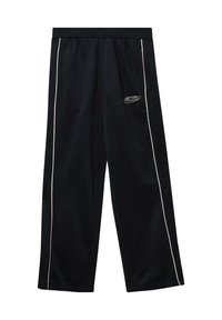 Zwarte sportbroek van zacht materiaal, met witte zijstrepen en een klein logo op de linkerheup. Elastische tailleband voor comfort.