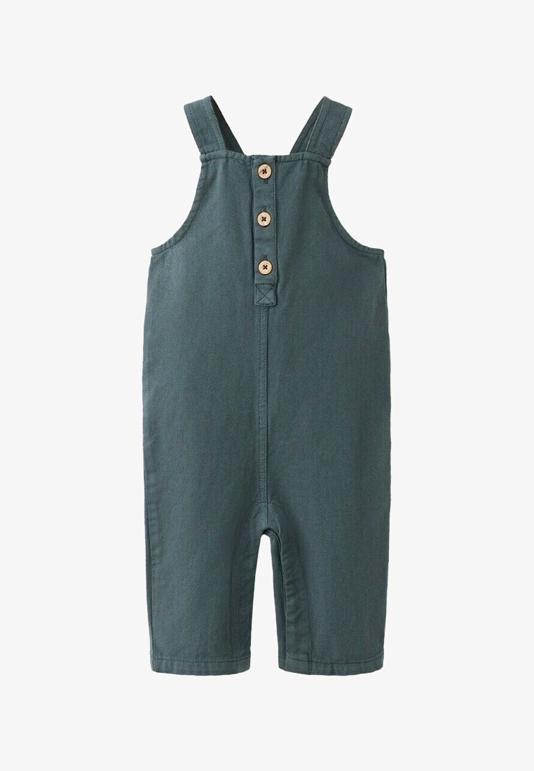 Salopette vert foncé pour tout-petit avec trois boutons en bois sur la poitrine et des bretelles sans manches, fabriquée en tissu doux.