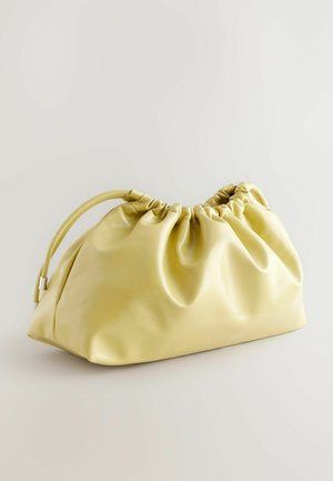 Next Delninukė - yellow