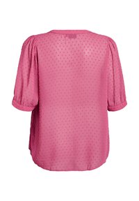 Ružová blúzka vyrobená z priesvitnej textílie s bodkovanou štruktúrou, krátkymi puff sleeve a zaobleným výstrihom. Chrbát má voľný strih.