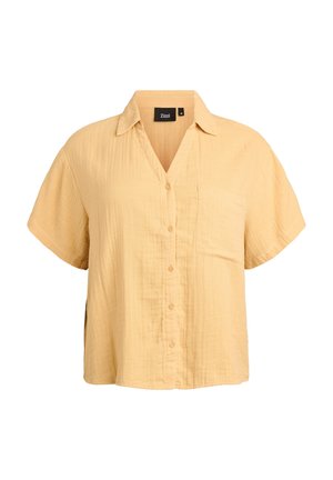 Luźna koszula z krótkim rękawem na guziki w bladożółtym kolorze, z kołnierzykiem i kieszenią na piersi, wykonana z lekkiej, teksturowanej tkaniny.