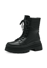 Botte montante en cuir noir à lacets avec tige rembourrée, semelle plateforme épaisse et accents texturés. Présente un bout rond et des coutures contrastées.