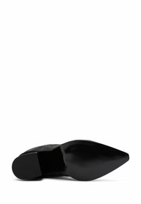 Black suede high-heeled shoe with a pointed toe, smooth texture, and a solid black rubber sole featuring a subtle tread pattern.
