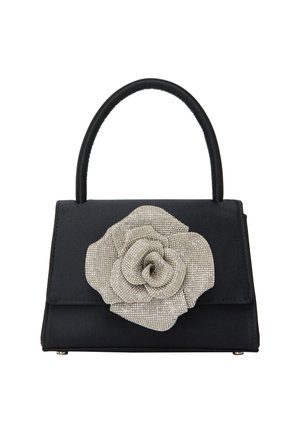 Sort håndtaske med en struktureret design, der har en stor sølvfarvet rhinestone blomst som accent og en kort, tekstureret hank.