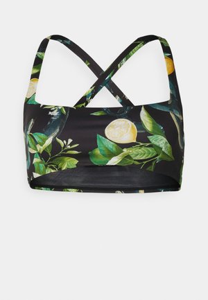 Sort bralette med krydsede stropper, prydet med et livligt blomstermønster af grønne blade og gule citrusfrugtskiver. Blødt, strækbart stof.