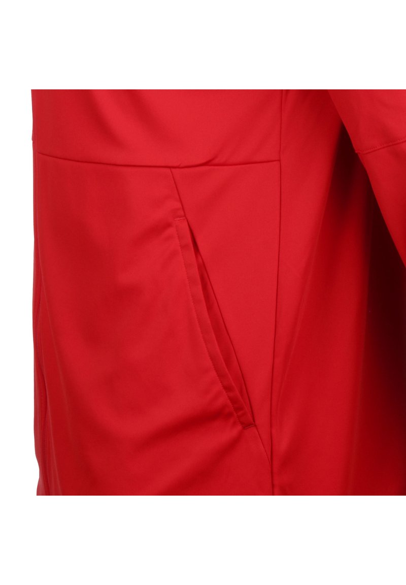 Czerwona kurtka z gładkiego, syntetycznego materiału. Posiada boczną kieszeń oraz smukły design z minimalną ilością szwów i niewidocznymi elementami metalowymi.