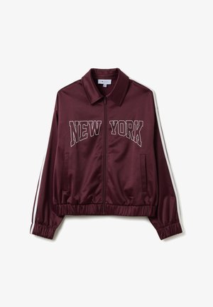 Giacca zip-up bordeaux con colletto, con "NEW YORK" stampato in bianco, polsini elasticizzati e strisce laterali bianche. Finitura in satin liscia.