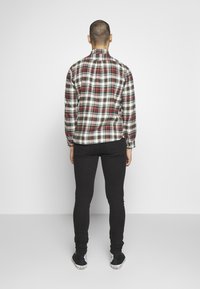 Weekday Vaqueros pitillo - black