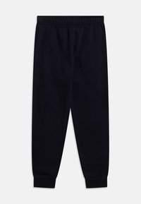 Pantalons de jogging noirs en tissu doux, avec une taille élastique, des ourlets resserrés et un design simple sans motifs ni ornements.