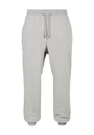Light gray cotton sweatpants with an elastic waistband, adjustable drawstring, side pockets, and ribbed cuffs at the ankles.