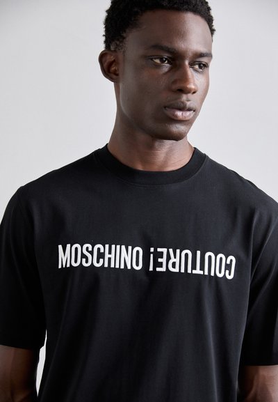 MOSCHINO Μπλουζάκι με στάμπα - fantasia nero