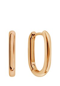 Złote kolczyki w formie obręczy z gładkim, zaokrąglonym wzornictwem, charakteryzujące się eleganckim, minimalistycznym kształtem owalnym oraz bezpiecznym mechanizmem zapięcia.