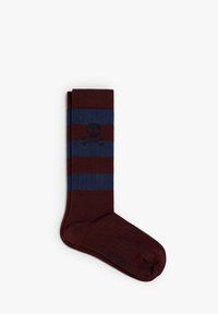 Calcetines a rayas en burdeos y azul marino, con un diseño de calavera y huesos cruzados. Textura suave con detalles acanalados en la parte superior.