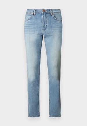 Jeans azzurri chiaro a taglio slim con bottoni frontali e zip, stile a cinque tasche e delicata scoloritura su cosce e ginocchia.