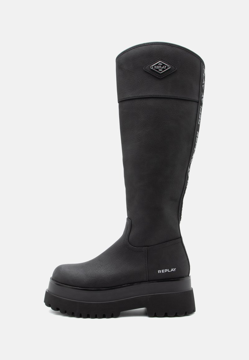 Black knee-high leather boot with thick lug sole, "Replay" logo near heel and at top front, and branded strip running down the back.