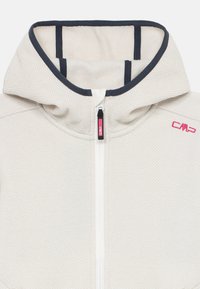 Helle beige Zip-Hoodie mit strukturiertem Muster, marineblauen Akzenten und einem Fleecefutter. Mit zentralem Reißverschluss und CMP-Logo in Pink.