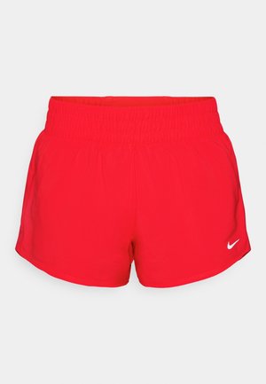 Rde športne kratke hlače iz lahkega materiala, z elastičnim pasom, obrobljenimi robovi in majhnim belim Nike logotipom.