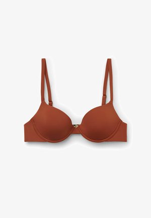 Brauner, geformter Cup-BH mit verstellbaren dünnen Trägern und einem Verschluss vorne auf weißem Hintergrund.