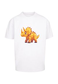 White short-sleeve t-shirt featuring a cartoon orange triceratops design with a textured look and playful expression.