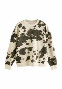 Sweat-shirt couleur crème avec un imprimé tacheté de vache noir et marron. Col et poignets côtelés ; texture de tissu doux. Coupe décontractée et confortable.
