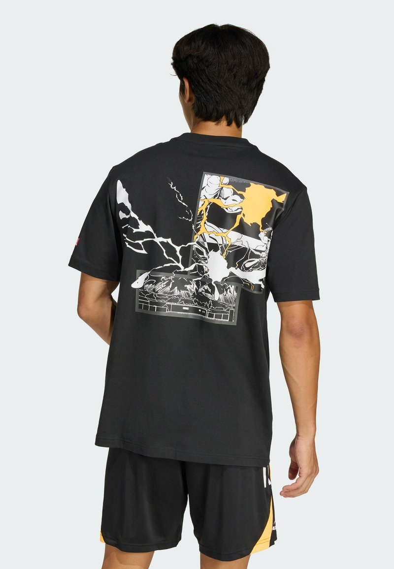 Czarny bawełniany t-shirt z kolorowym wzorem graficznym na plecach, zawierający białe, żółte i szare elementy z motywami piorunów.