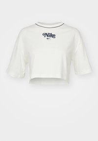 Avkortad T-shirt med kort ärm i off-white bomull, med en marinfärgad broderad "Nike"-logotyp och kontrasterande detaljer vid halsringningen.