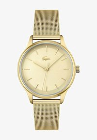 Seleccionado, gold-coloured