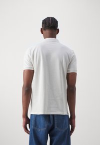 HUGO DERESO - Poloskjorter - open white