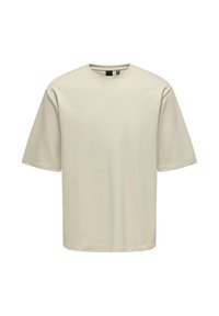 T-shirt beige clair à manches courtes, col rond, en tissu de coton lisse. Présente une coupe décontractée avec des manches à coupe droite.