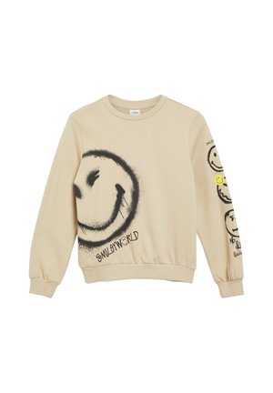 Beige lange mouwen trui met groot zwart gespoten smiley gezicht en "Smileyworld" tekst, plus drie kleinere smileys op de rechtermouw.