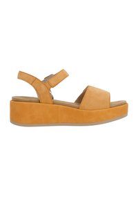 Orange suede platform sandals with adjustable ankle strap, wide front band, and textured insole. Thick beige rubber sole.