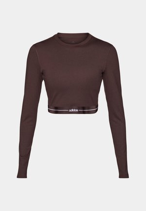 Top sport maro cropped cu mâneci lungi, gât rotund și logo Adidas pe banda elastică de la talie.