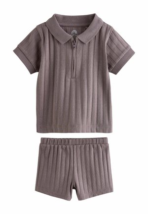 Short-sleeve ribbed polo shirt with zipper and matching elastic waist ribbed shorts in muted brown color.