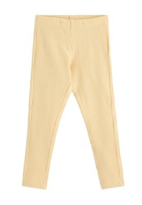 Gule ribbede leggings med elastisk talje, tætsiddende pasform og en glat tekstur. Designet har lodrette striber overalt.