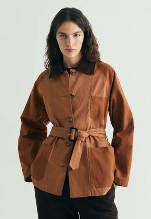 WAX - Gabardina - terracotta
